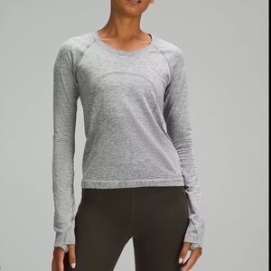 lululemon heathered grey swiftly tech size 2. great condition.